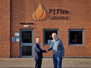 CheckFire and PJ Fire new owners shaking hands